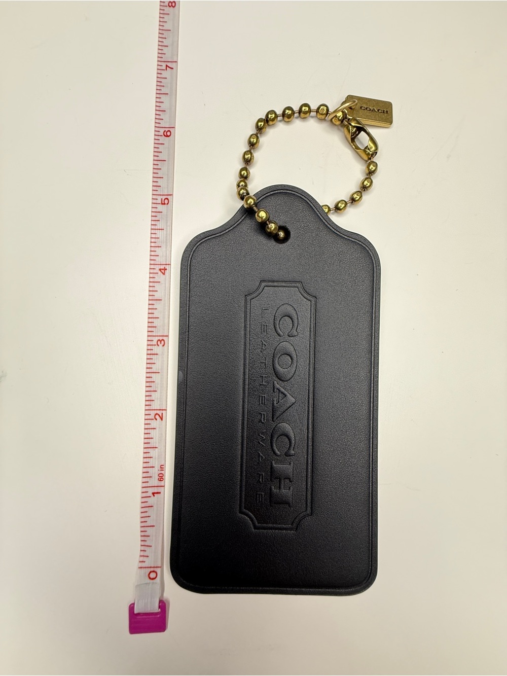 COACH Oversized Black Leather Hang Tag with Gold Chain